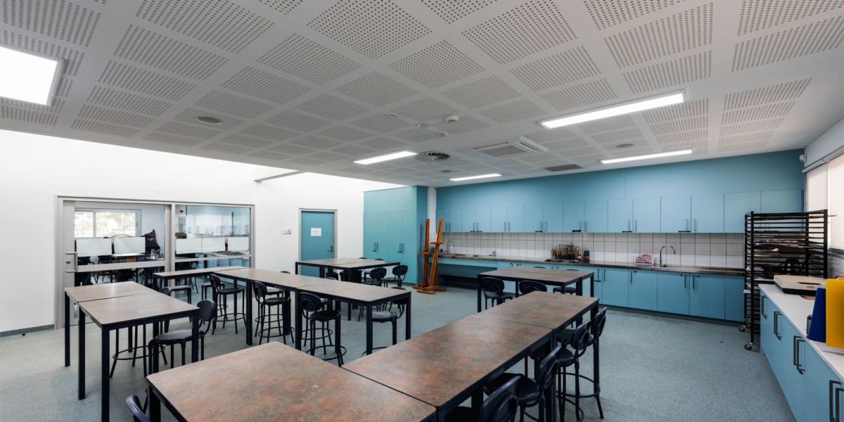 Interior Science Classroom with Desks, Chairs and Blue Cabinetry