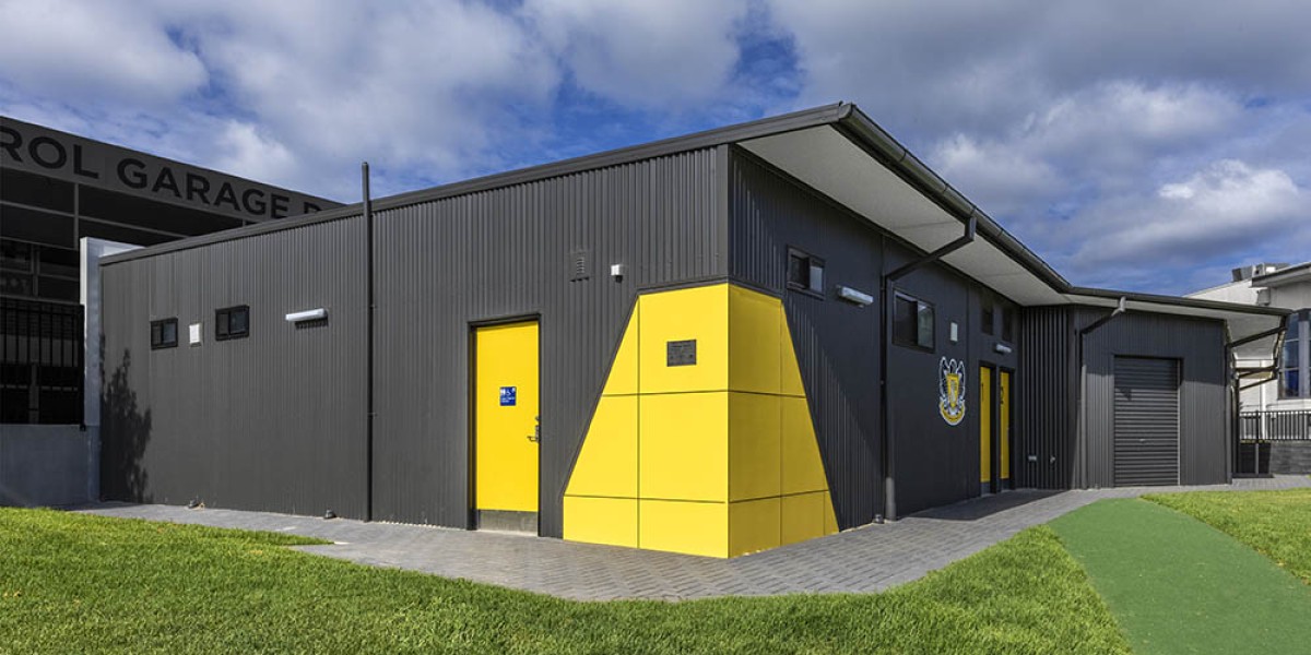 Exterior Toilet Block with Corrugated Steel Cladding and Yellow Panelling and Doorsfacilities