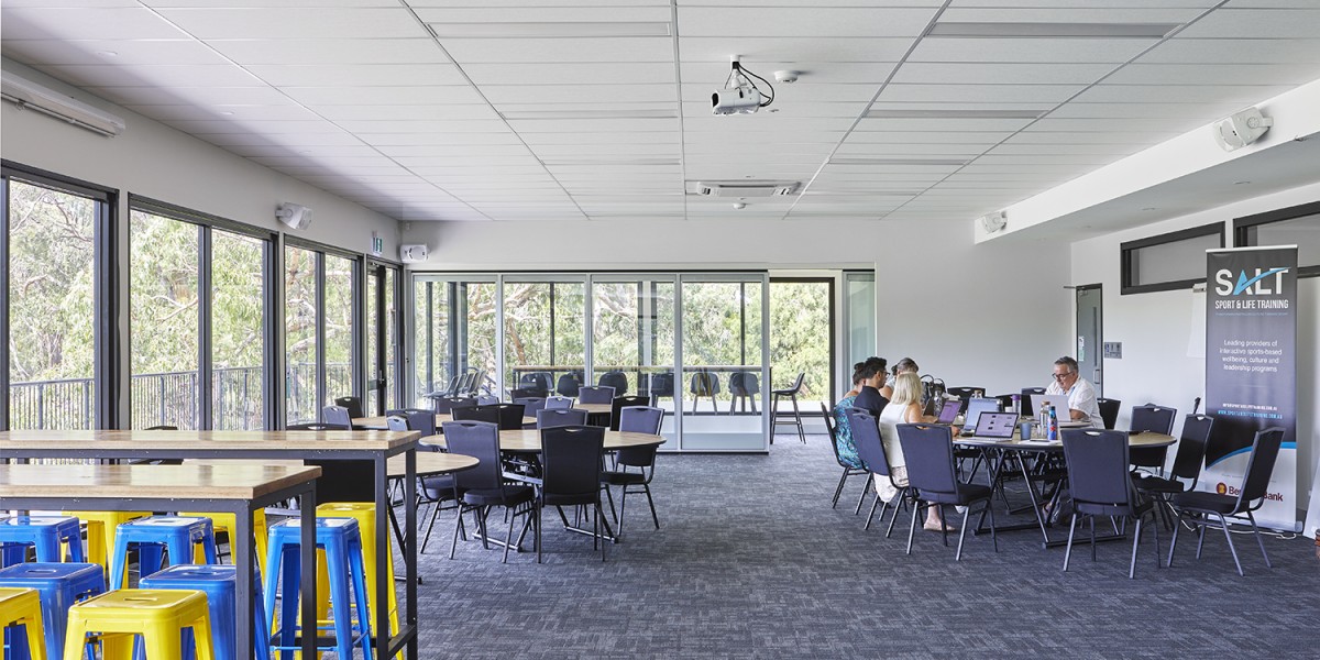 Recreational Space with Carpeted Floors, Tables and Seating