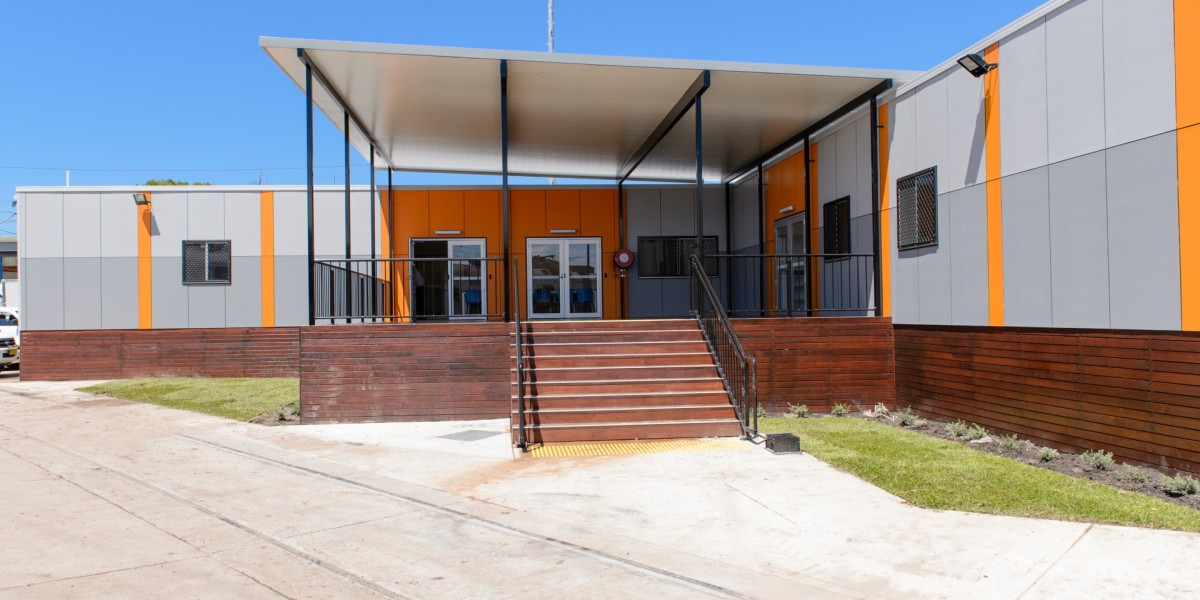 Exterior Modular Building with Grey and Orange Panelling, Covered Deck and Stairs
