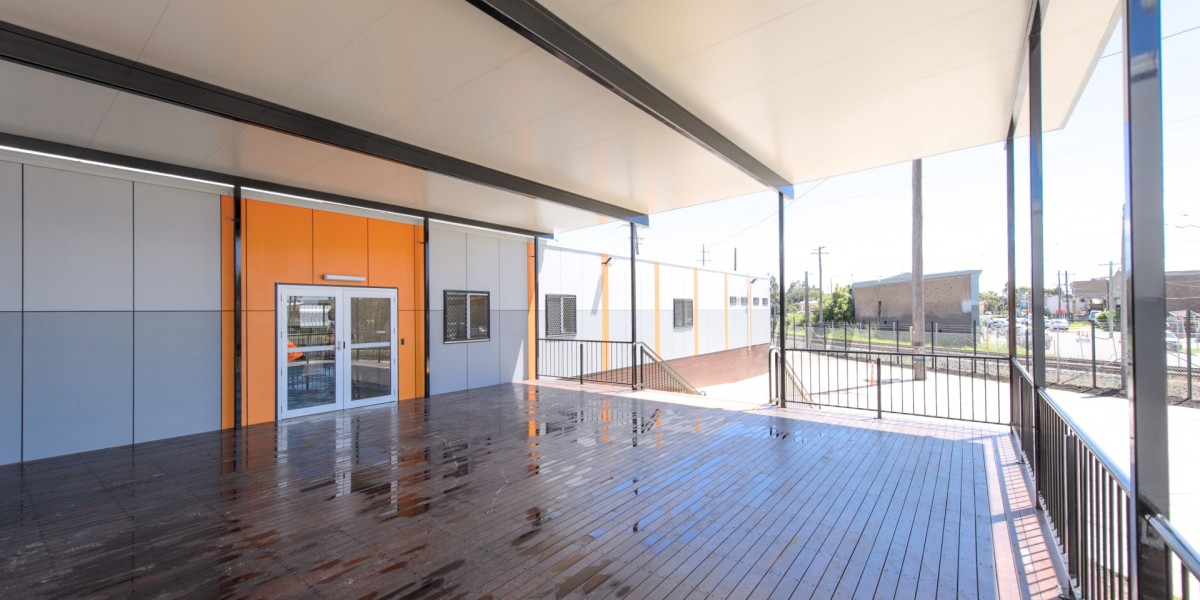 Exterior Modular Building with Covered Wooden Deck and Railings