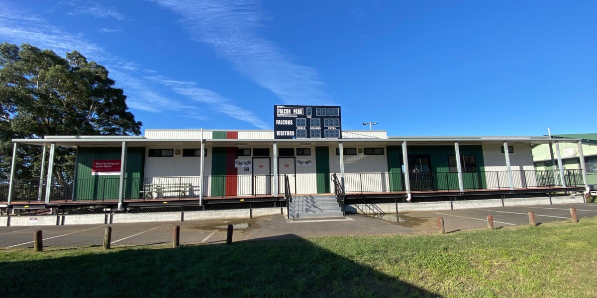 Demountable Sports Building Facing Sports Grounds with Green and Red Paint