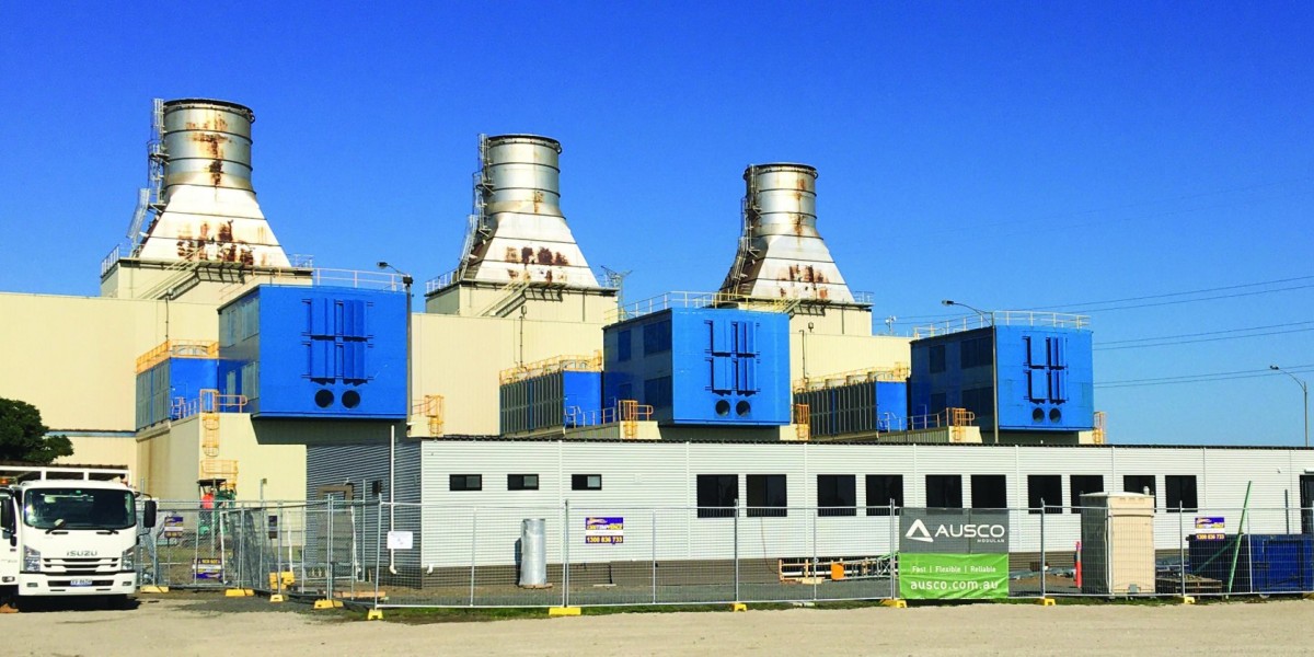 Demountable Buildings and Metal Fencing in Front of Power Station