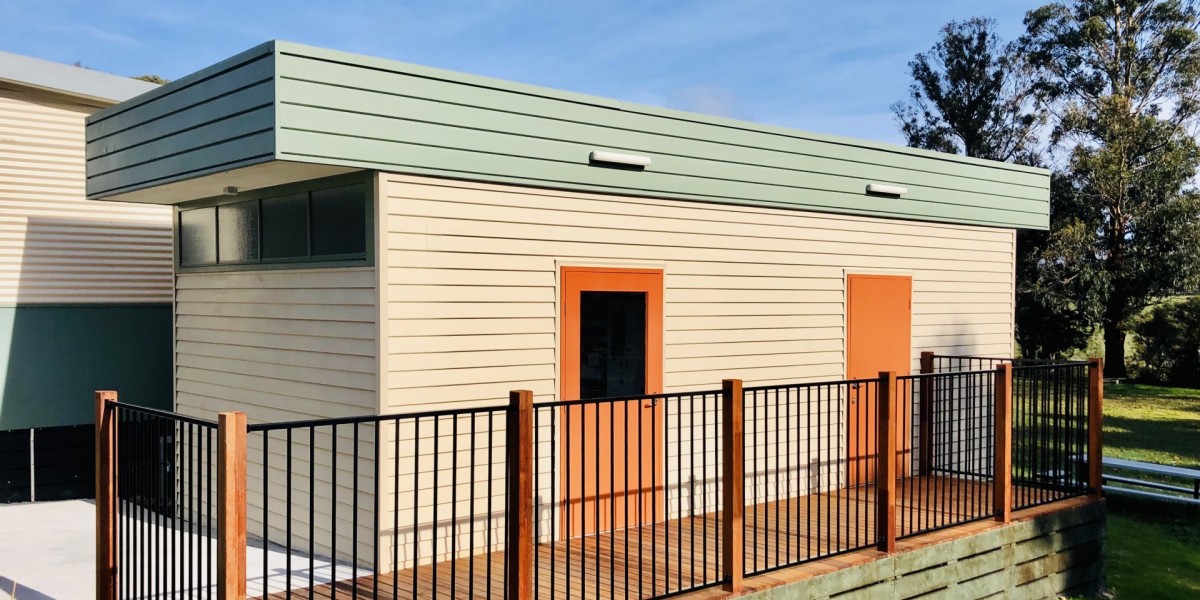 Modular Building with Wooden Panelling and Fenced Deck Walkway