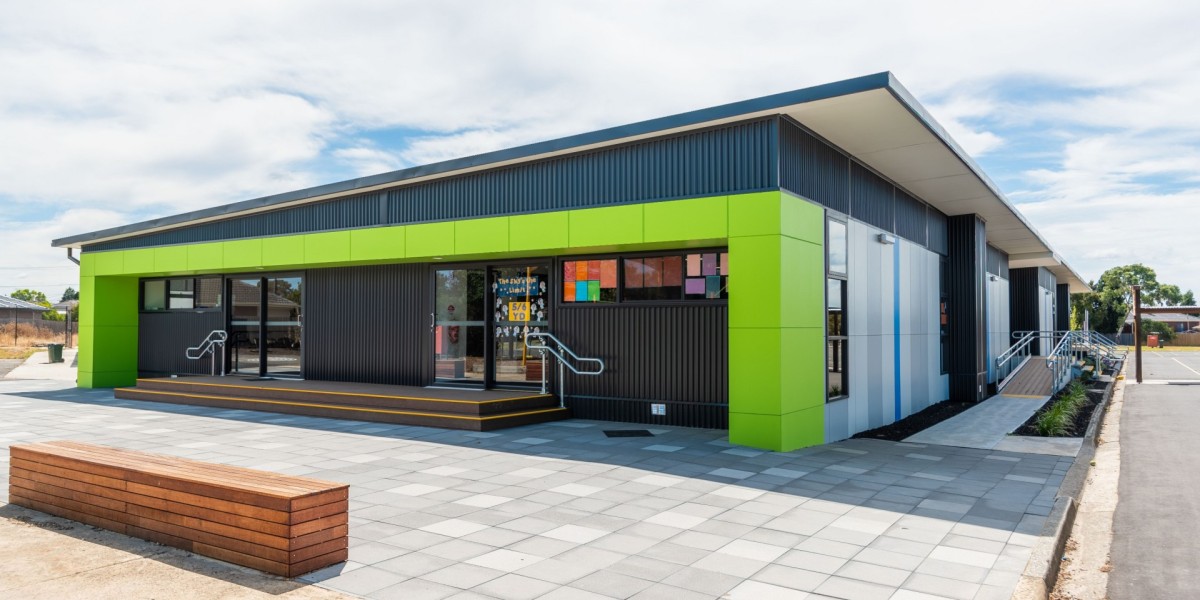 Exterior School Building with Tiled Pavers and Lime Green Panelling