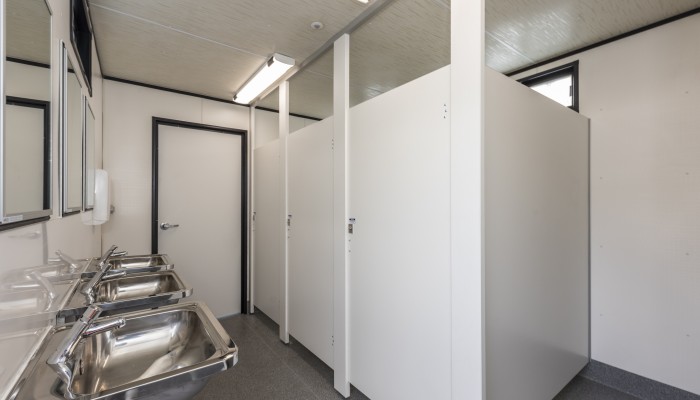 Spacious toilets with low flow taps from Ausco