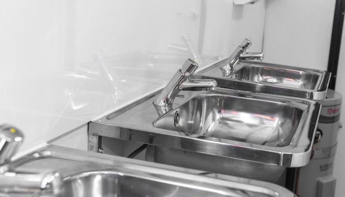 Low flow taps for a sustainable toilet solution with Ausco