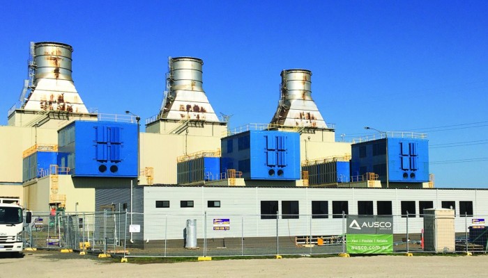Demountable Buildings and Metal Fencing in Front of Power Station