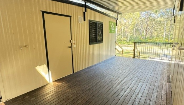 Covered deck area linking the buildings