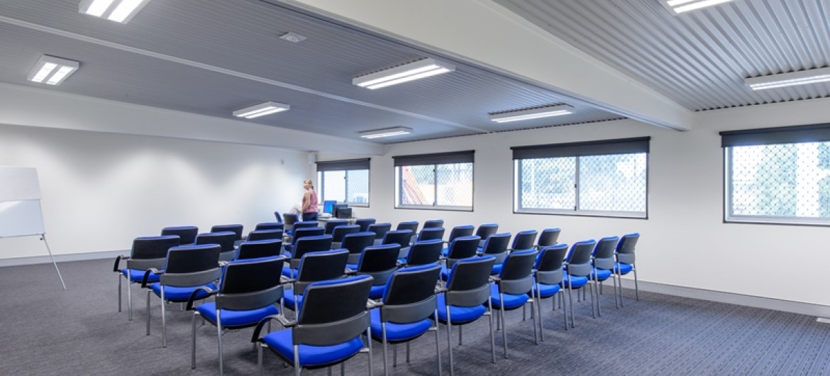 Conference Room with Blue Chairs and White Board