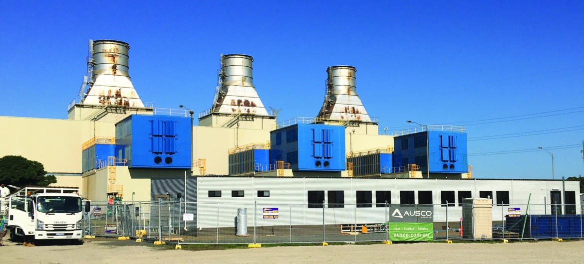 Demountable Buildings and Metal Fencing in Front of Power Station